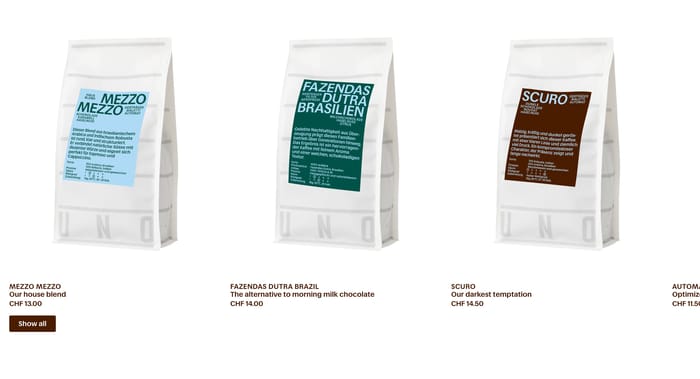 Caffè Uno product showcase with three white coffee bags, colored labels, names, CHF prices, and a cropped fourth pack