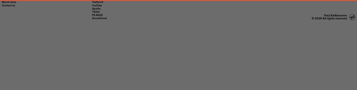 Paul Kalkbrenner site footer with merch and contact links, social platforms, and 2026 copyright on a dark gray band.