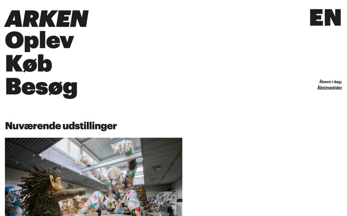 ARKEN hero with oversized ARKEN and EN type, stacked Oplev Køb Besøg nav, hours, and gallery sculpture photo