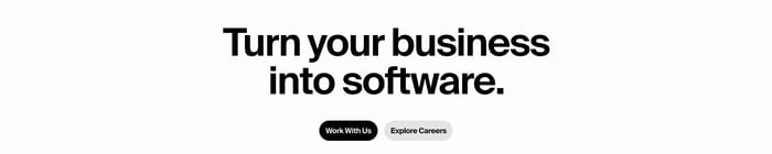 Poetic primary CTA section with the headline Turn your business into software and Work With Us and Explore Careers buttons