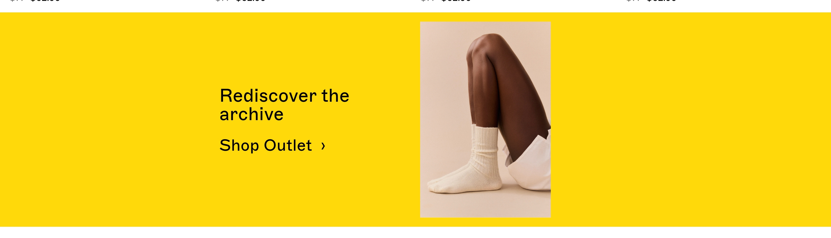 Pairs Socks CTA banner: yellow field, Rediscover the archive text, Shop Outlet link, cream sock photo