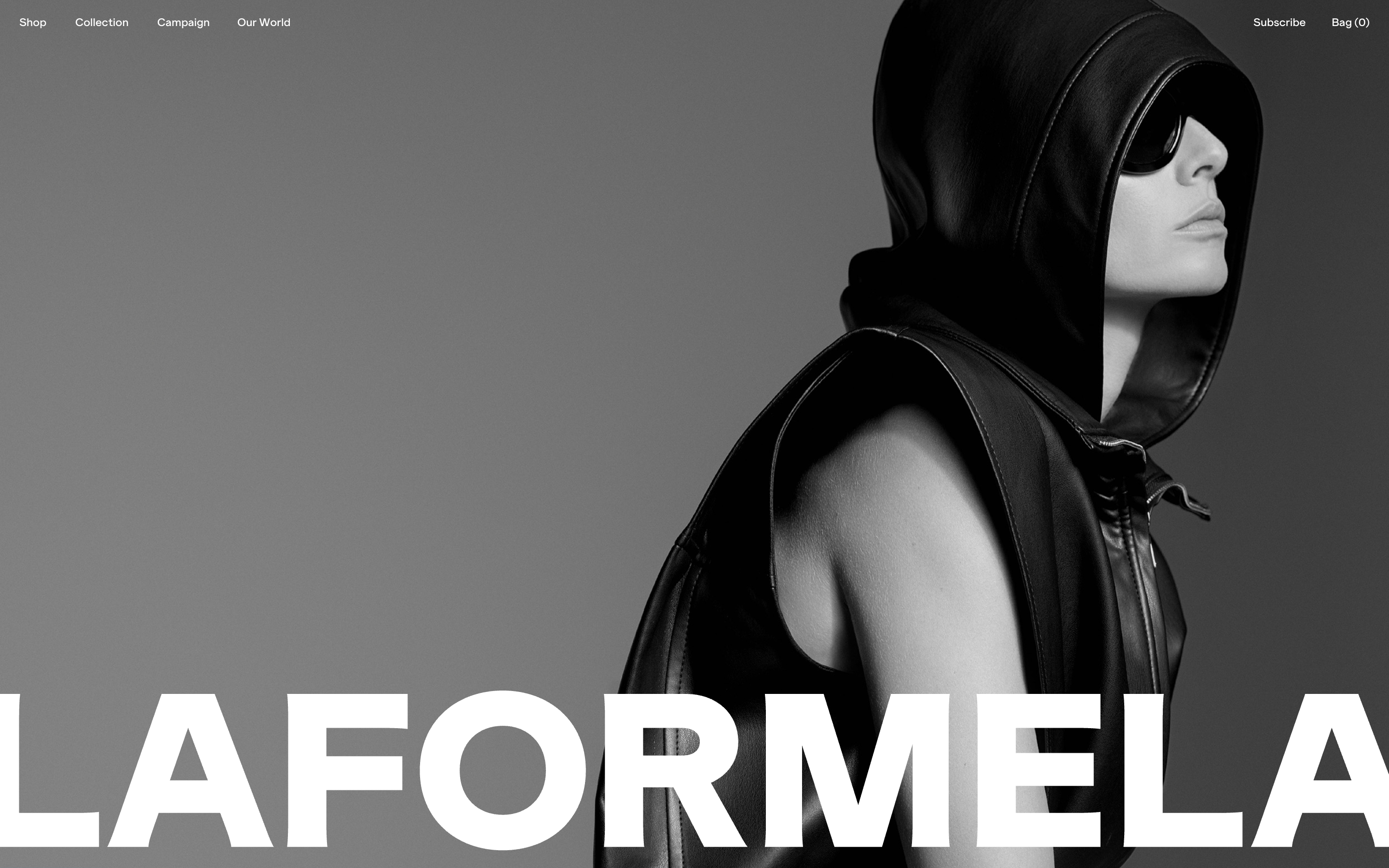 Laformela hero section: monochrome hooded model on the right, sparse nav, oversized LAFORMELA wordmark across the bottom