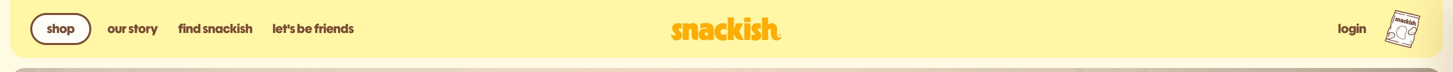 Snackish navigation bar with shop pill, text links, centered orange logo, login, and chip-bag icon on yellow.