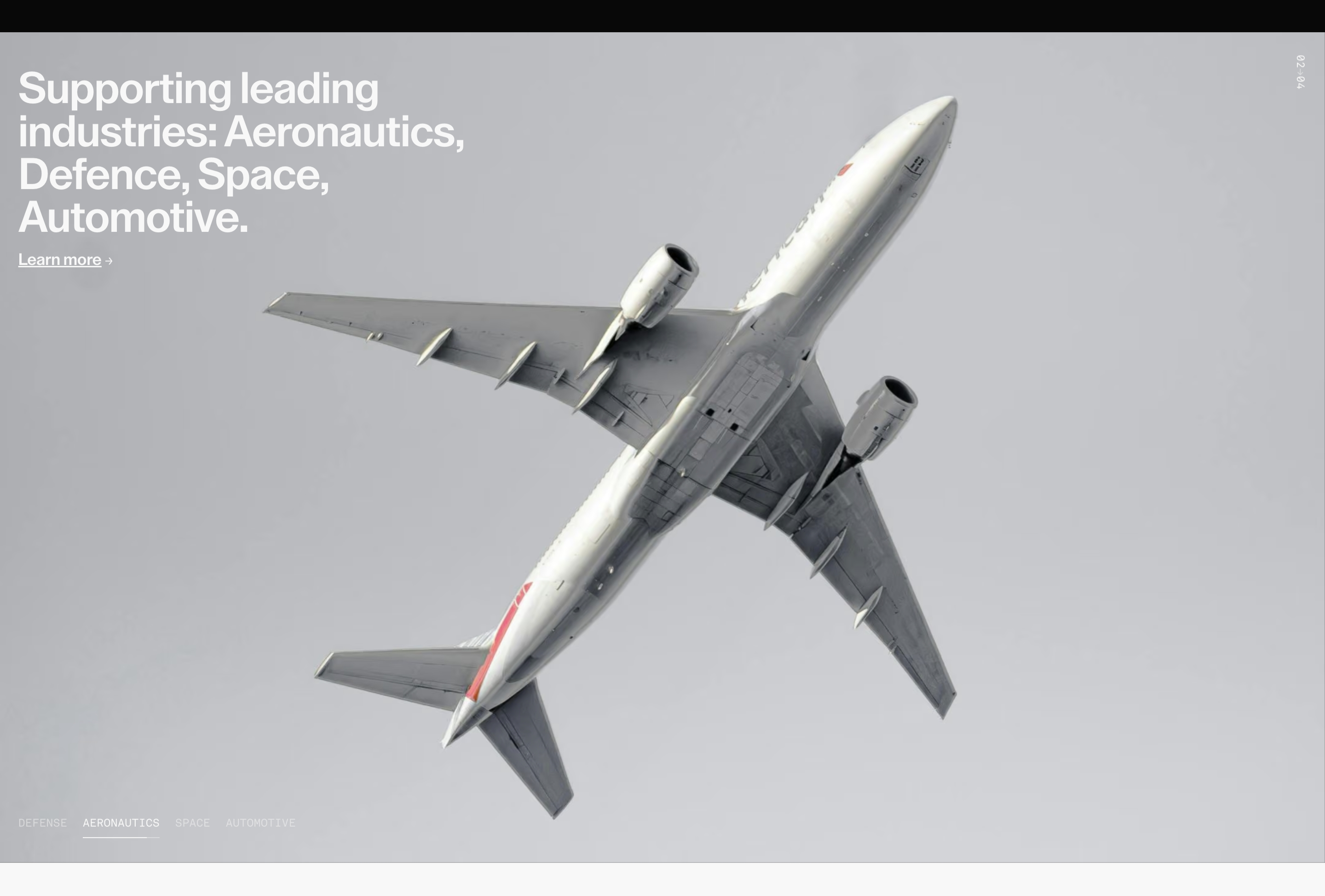Icomat industry applications section: white headline and Learn more over an airliner underside on gray sky