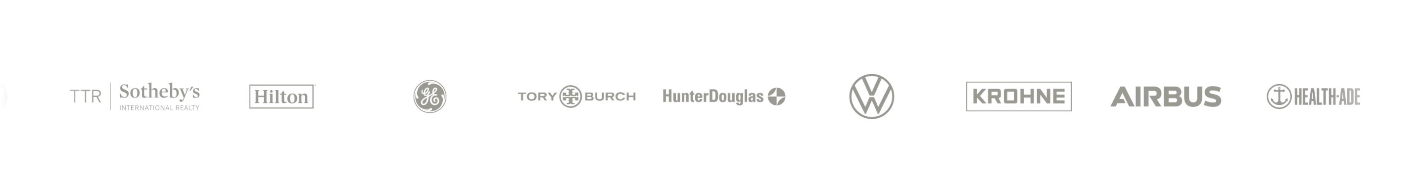 Glide client logo bar with gray Sotheby’s, Hilton, GE, Tory Burch, Volkswagen, Airbus and other marks on white.