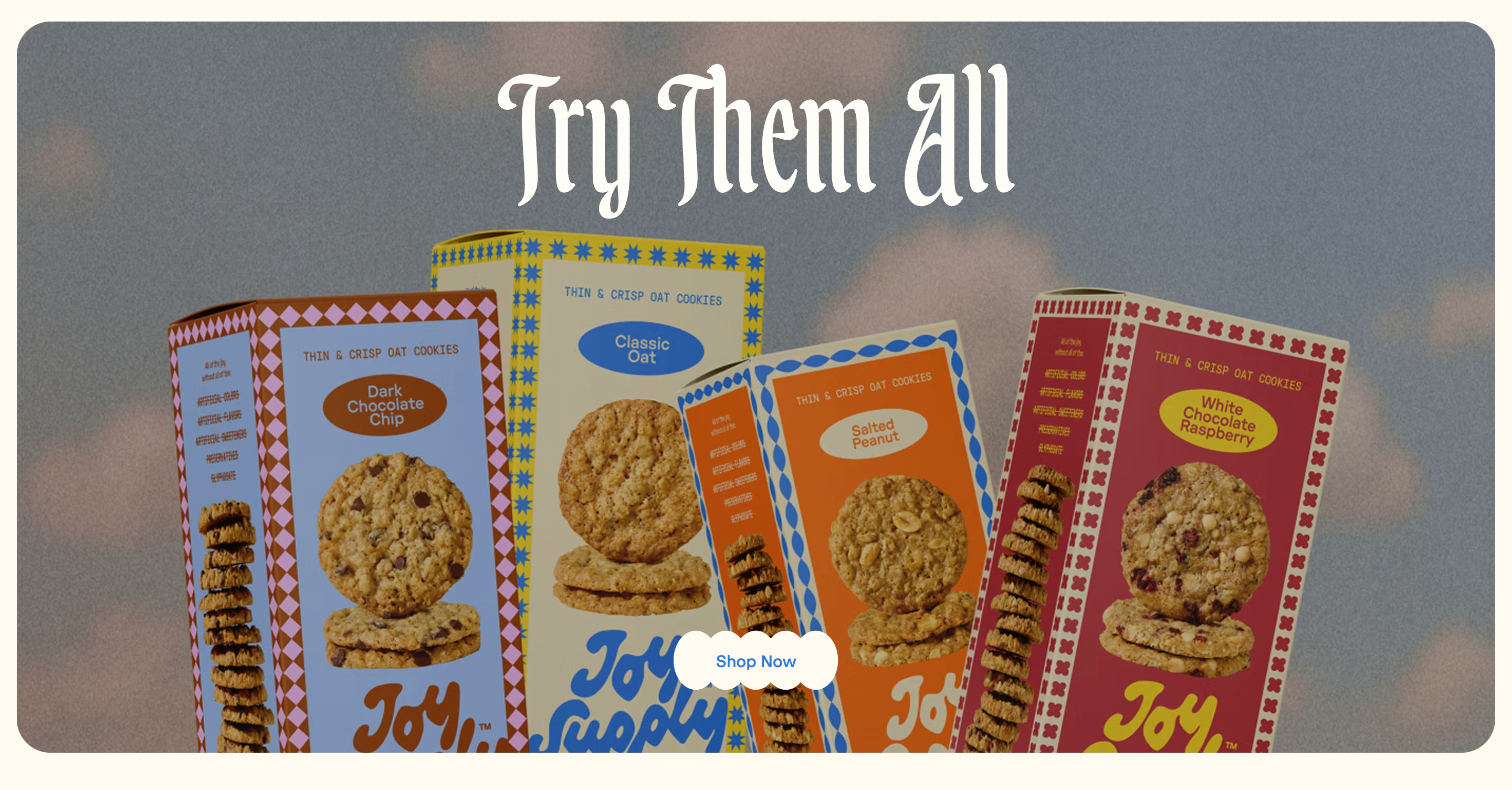 Joy Supply Try Them All CTA with four colorful cookie boxes and a Shop Now button